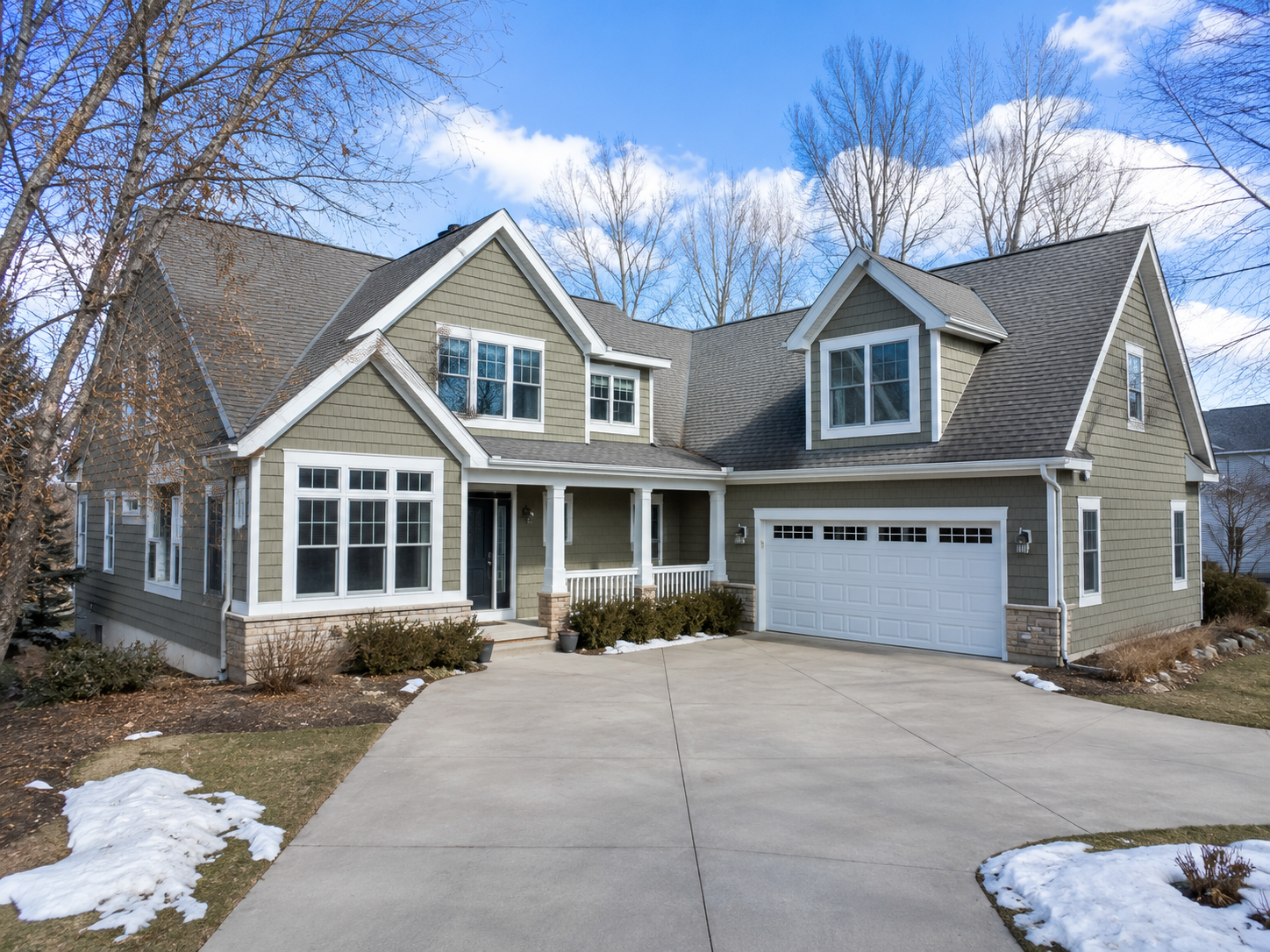 Clean home exterior and windows in Traverse City MI after professional cleaning